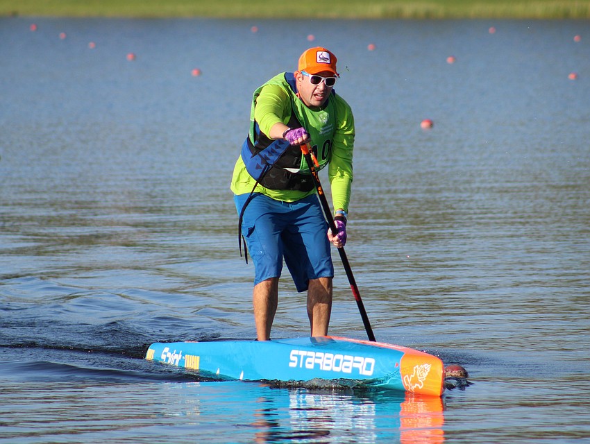 Pinellas County's Michael Tuason finishes a 4800 meter race in 36 minutes and 27 seconds.