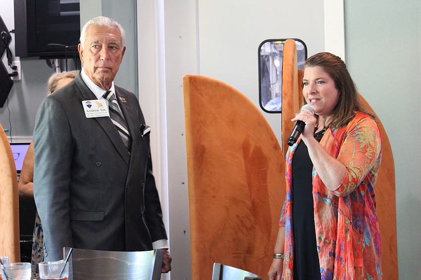 Andrew Vac and Kim Verreault, president and CEO of the Longboat Key Chamber of Commerce, welcome guests to the 