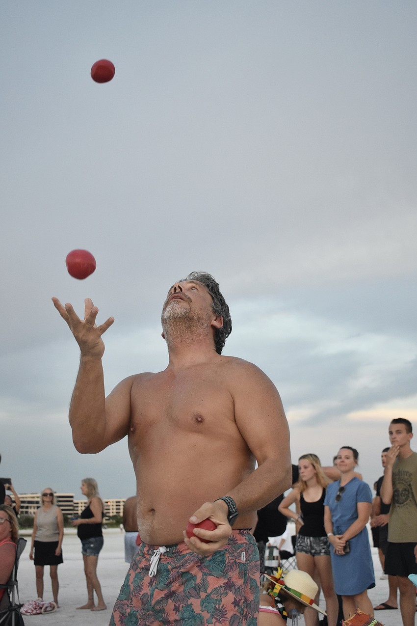 Bjorn Thorkelson juggles in the circle.