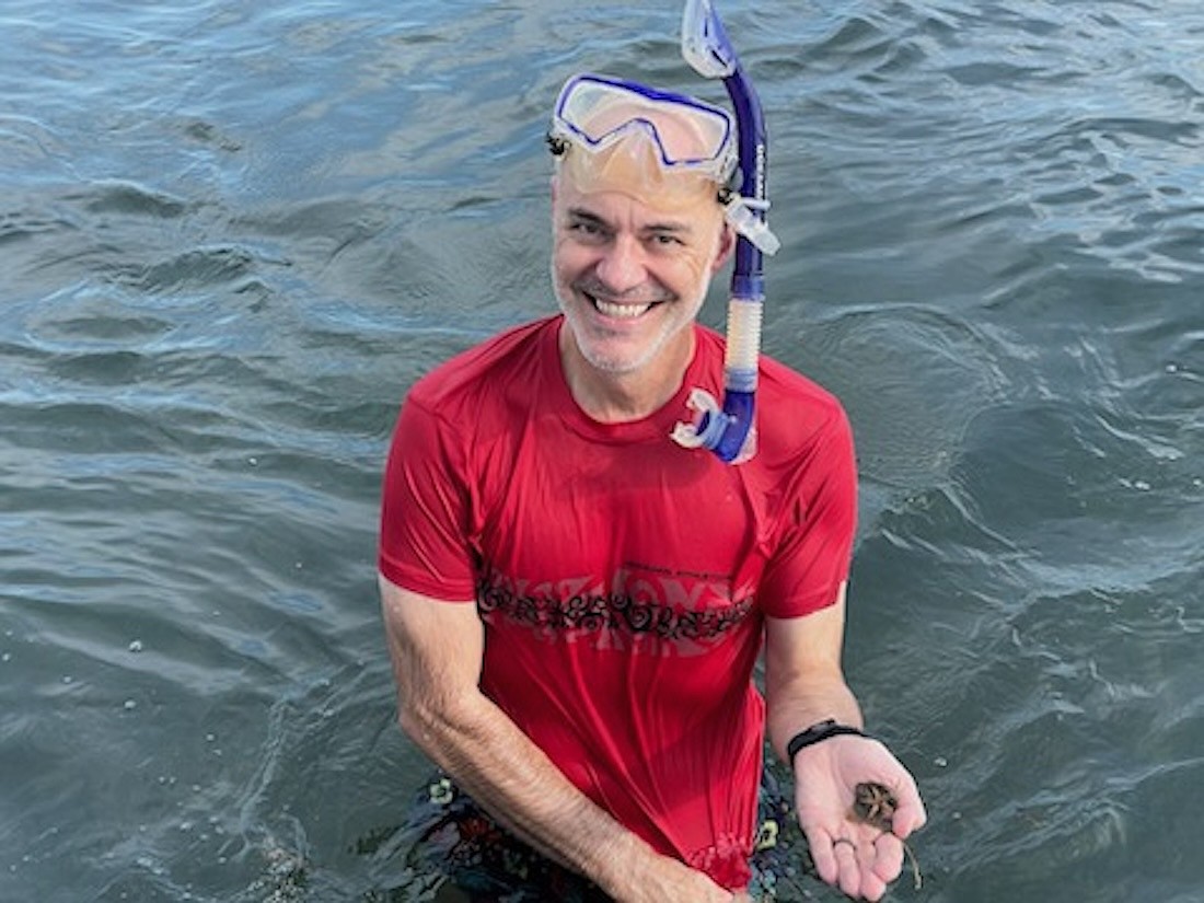 Corey Vandenhoe snorkeling during the Great Scallop Search
