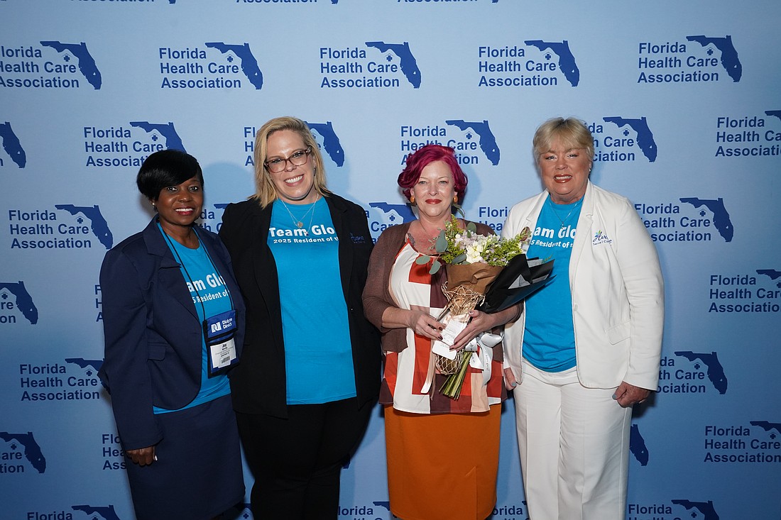 Misty Kingsley, second from right, receives the 2025 FHCA Compassion in Action Award for Social Services Professional of the Year. Courtesy photo