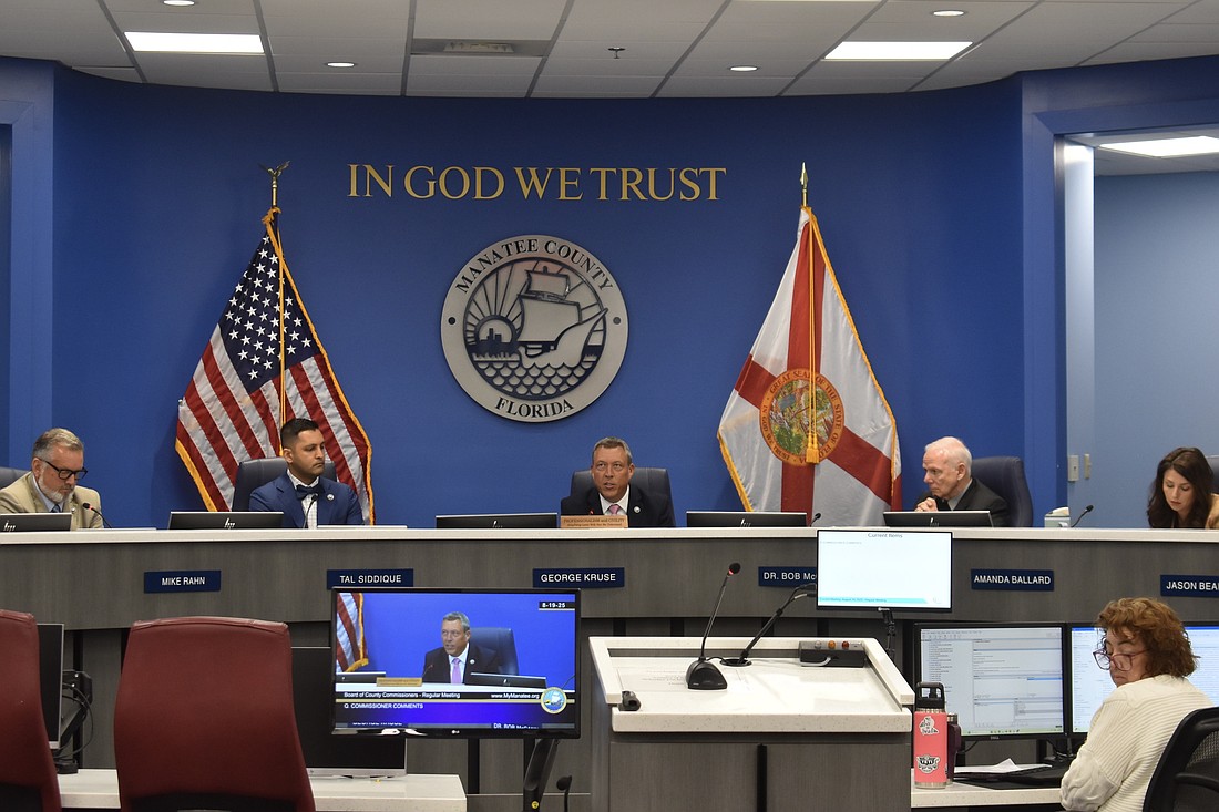 Commission Chair George Kruse (center) directs staff on Aug. 19 to cancel the Aug. 21 land use meeting.