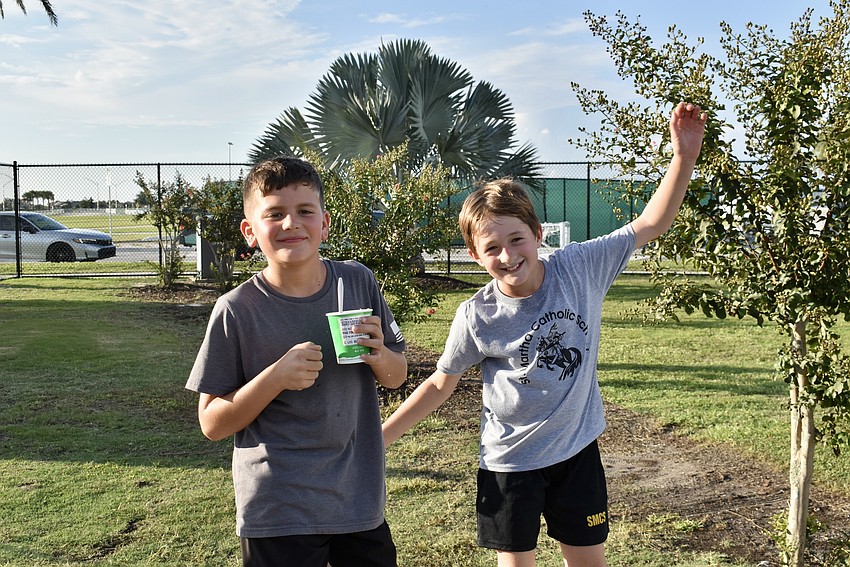Lakewood Ranch's Matthew DeFelic and Luca Di Meo dance near the DJ. The 10-year-olds play soccer for the Lakewood Ranch Chargers.