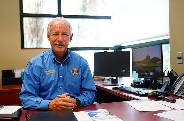 Longboat Key town manager Howard “Tip” Tipton poses for a photo in his office at town hall Monday, Aug. 18. Tipton spoke to the Longboat Observer about the proposed 2026 fiscal year budget which adds three staff positions to the payroll.
