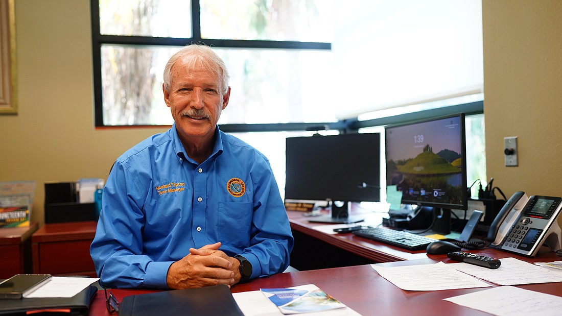 Longboat Key town manager Howard “Tip” Tipton poses for a photo in his office at town hall Monday, Aug. 18. Tipton spoke to the Longboat Observer about the proposed 2026 fiscal year budget which adds three staff positions to the payroll.