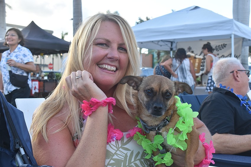 Ellenton 's Kimberly Gitzler and her 4-year-old chihuahua mix Maui got into the theme through dressing up and dancing.