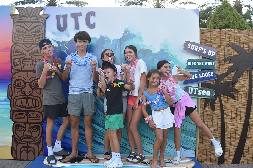 Night market visitors catch a wave at the night market at UTC on Aug. 21.