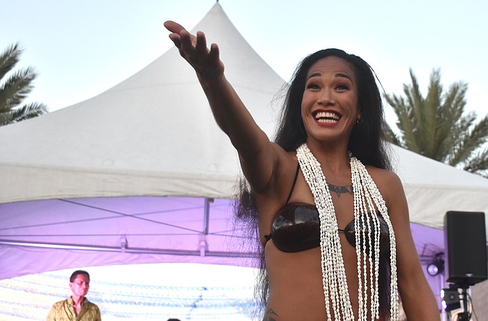 Kawailana Vaiaoga of Aloha Productions invites women and children up to dance.