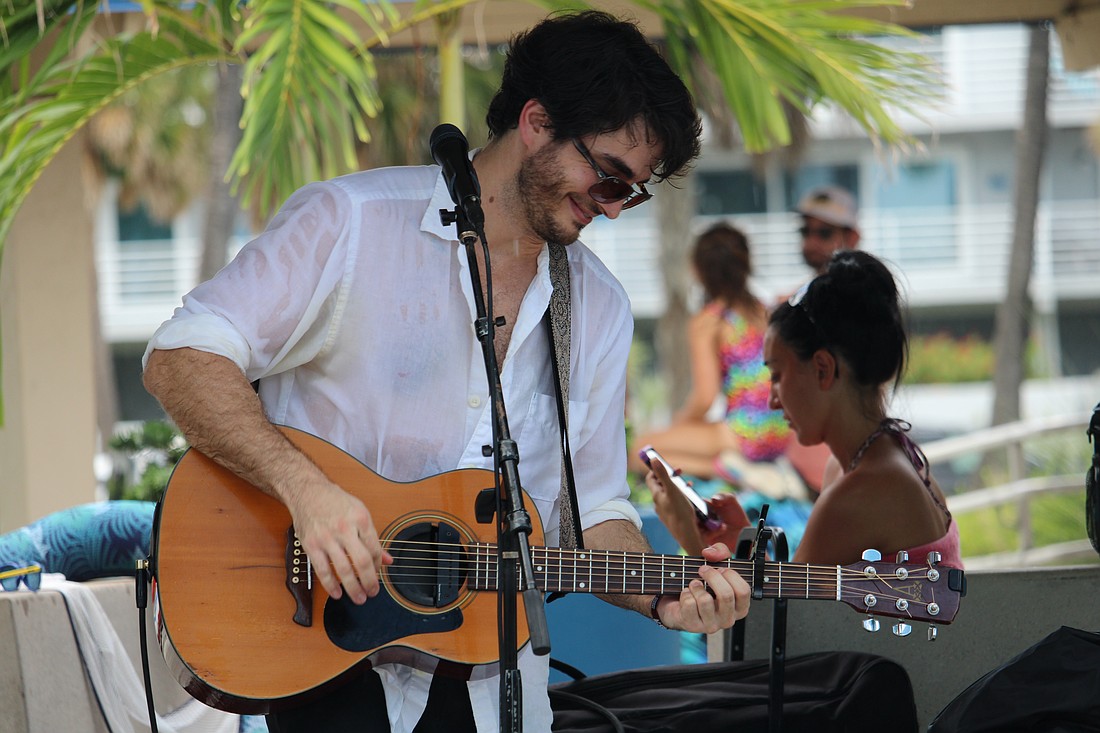 Acoustic guitarist and singer Ross David played some tunes on Aug. 17 at Lido Beach.