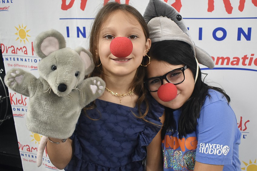 Gabriella Yates, 10 and Ayat Mezroub, 9, dress up at the Drama Kids International.