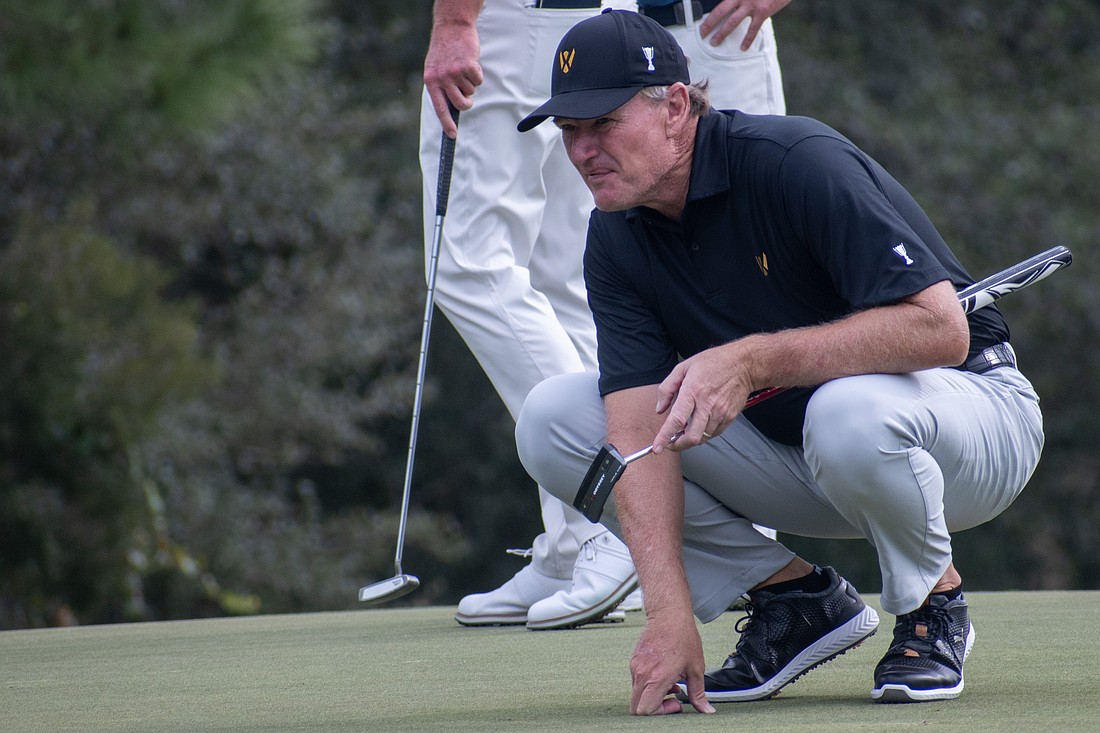 Golfing legend Ernie Els lines up at putt in 2023 at The Concession during the World Champions Cup. The Concession will host the Senior PGA Championship in 2026, 2027 and 2028. Els is likely to be a major draw. Could the area also see Tiger Woods?