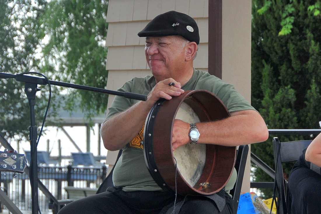 Chuck Spano plays the bodhrán, an Irish frame drum, during the city's Celtic Festival in 2016. Courtesy photo