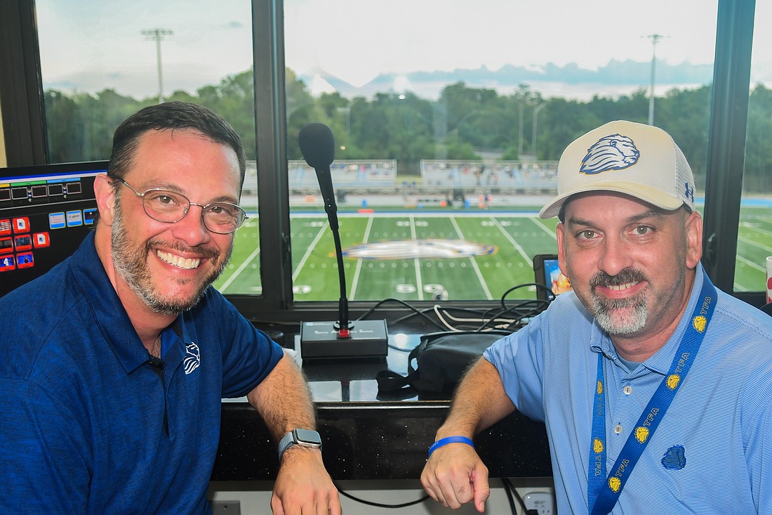 Joe Fana, left, and Dr. Tim Dix are the voices heard at Warden Stadium this football season.