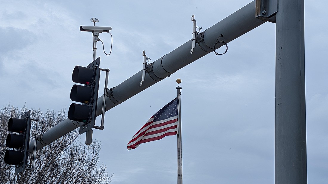 Florida Department of Transportation crews had removed the Gulf of Mexico Drive sign from the intersection at Bay Isles Parkway.