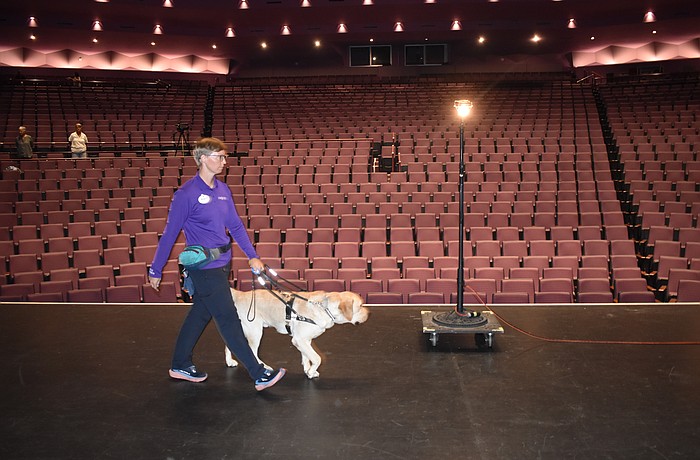 Megan Nystrom walks Baker.