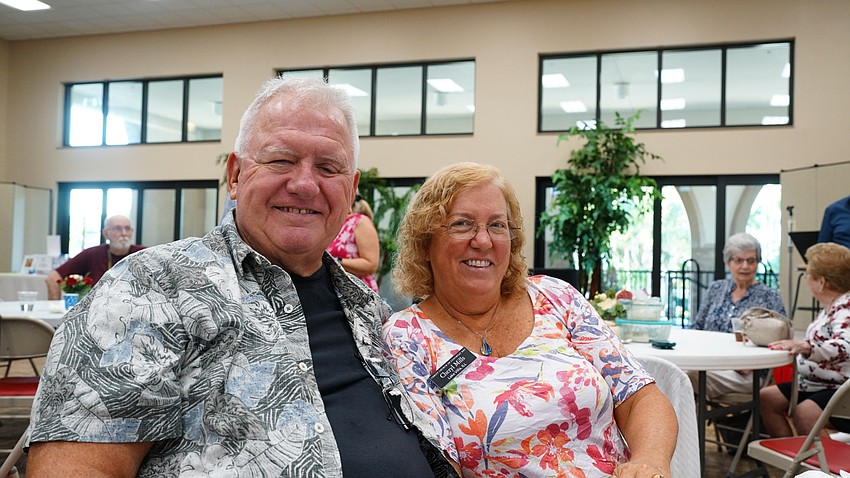 Chris and Cheryl Mills pose for a photo together at Christ Church of Longboat Key's annual fish fry Thursday, Aug. 27.