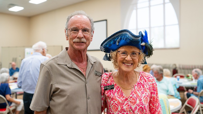 Christ Church of Longboat Key pastor Julia Piermont poses for a picture with her husband, Dennis Piermont, at the church's annual fish fry Thursday, Aug. 27.