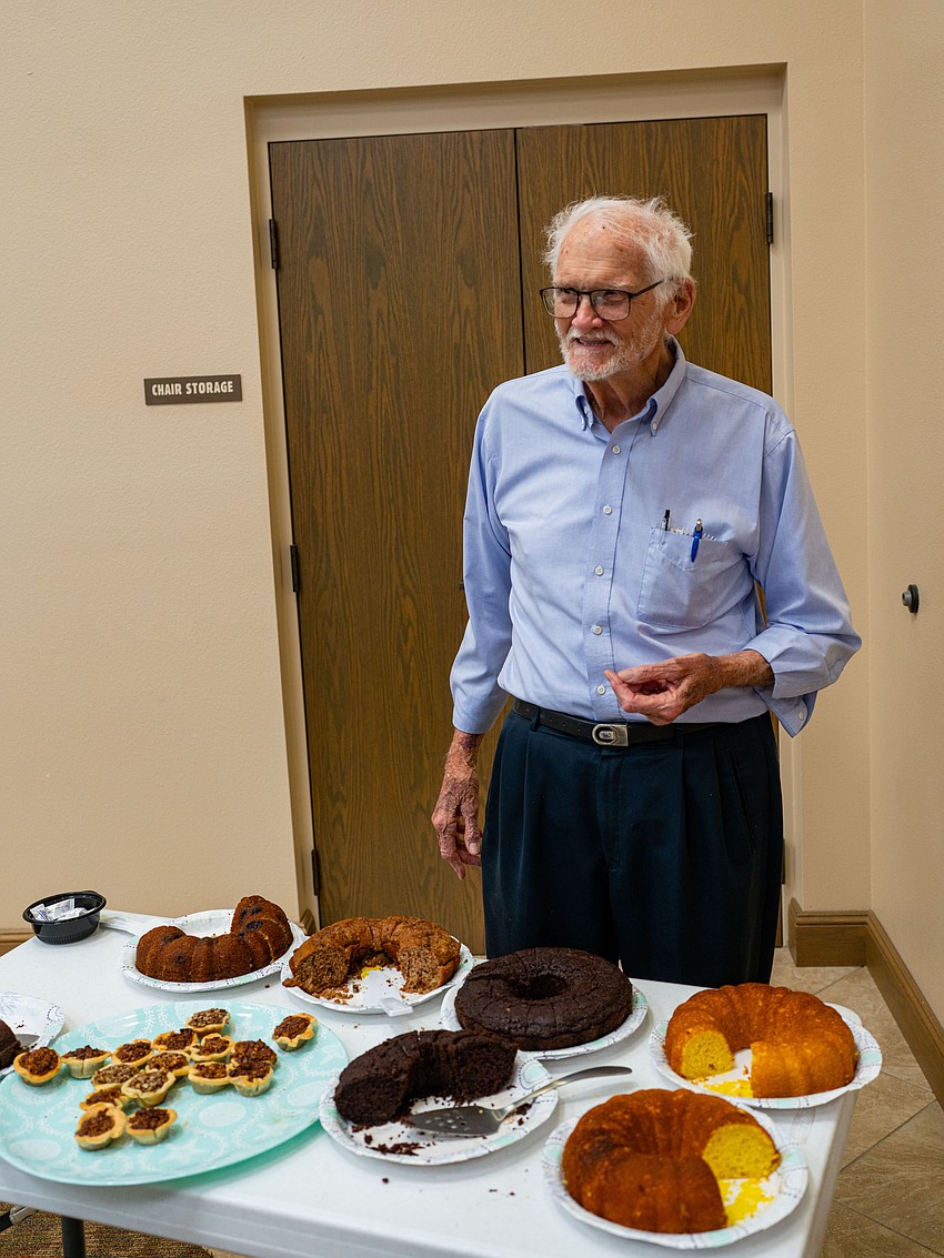 Jim Seaton fixed an array of cakes and pies for Christ Church of Longboat Key's annual fish fry Thursday, Aug. 27.