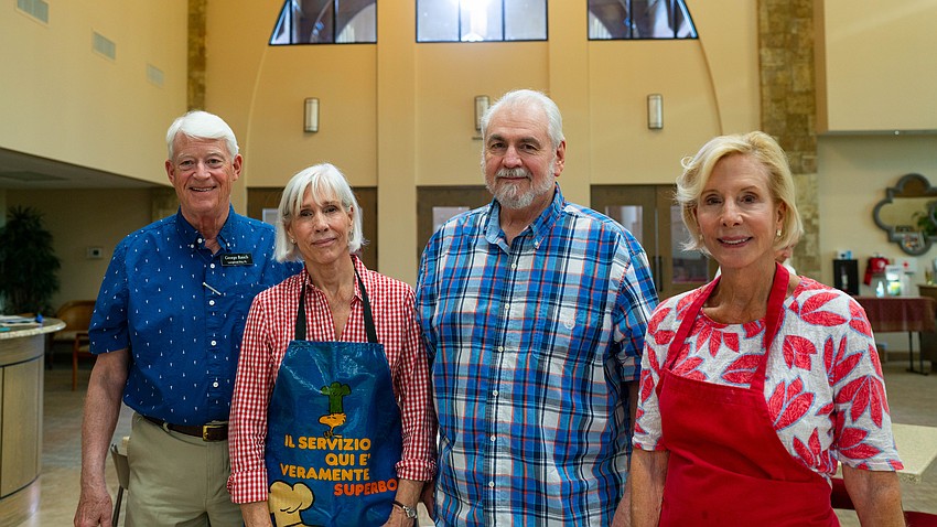 George Rauch, Sally Rauch, Mark Huber and Lucia Eihlein pose for a photo together at Christ Church of Longboat Key's annual fish fry Thursday, Aug. 27.