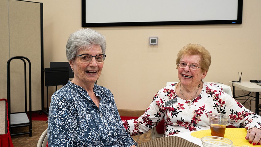 Alma Westfall and Jo Anne Hall pose for a photo at Christ Church of Longboat Key's annual fish fry Thursday, Aug. 27.