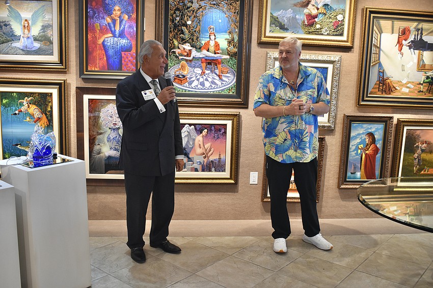 Andrew Vac of Re/Max introduces Guy Vincent.