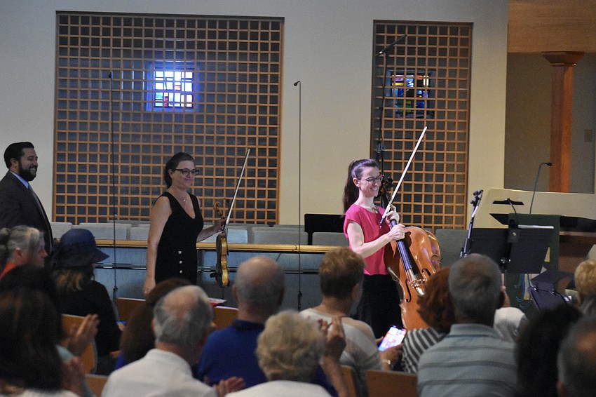 Jessé Martins, Milene Moreira and Nadine Trudel enter the room.