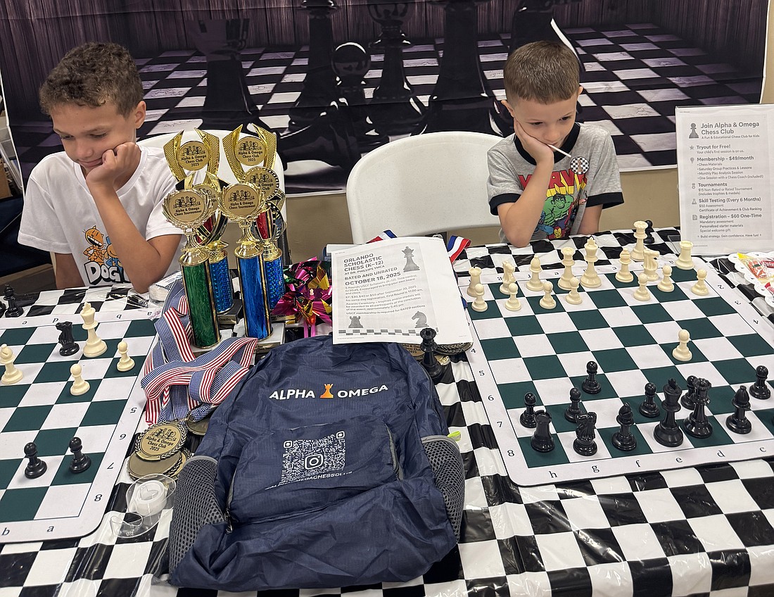 Andrew Tavarez and Sam Placa focused on the games of chess in front of them.