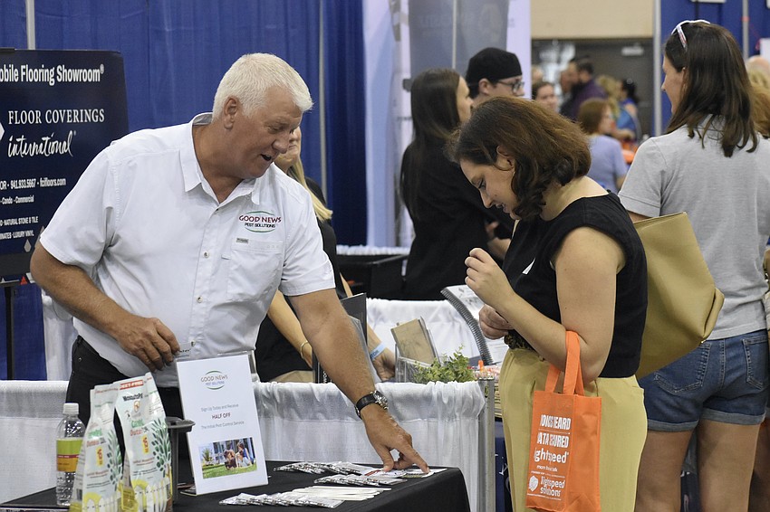 Dean Burnside of Good News Pest Solutions  talks with Jillian James of Loveland Center.
