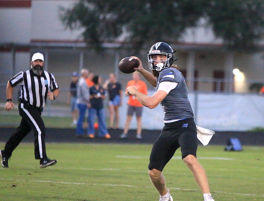 Cole Walker passed for a school-record 314 yards against University on Aug. 29 and threw for 285 against Deltona on Sept. 5. File photo by Brian McMillan