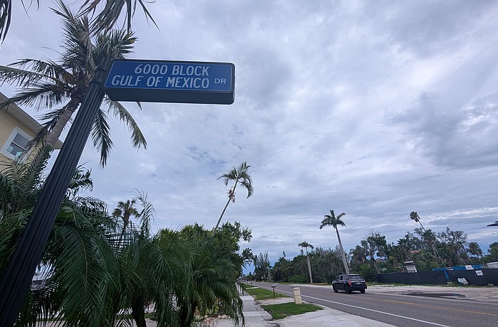 A street sign marking the 6000 block of Gulf of Mexico Drive owned by the town will remain for now as discussions on whether to rename the main thoroughfare are underway