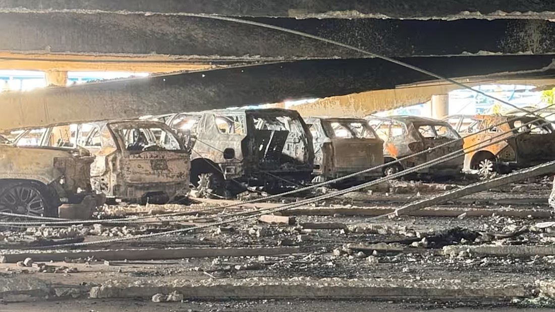 Cars damaged by a fire inside the Jacksonville International Airport hourly parking garage. The blaze struck the garage May 16, 2025.