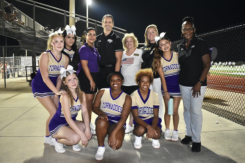 Front: Eleventh grader Khloe Lopez, eleventh grader Samari Branch, and eleventh grader Ottis Jackson. Back: Tenth grader Samantha Duncan, eleventh grader Marisol Torres, Deputy Superintendent and Chief Academic Officer Rachael O'Dea, Superintendent of Schools Terry Connor, school board member Robyn Marinelli, Chief of Secondary Education Megan Green, tenth grader Lesly Baca-Saldivar and Booker High School Principal Rachel Shelley