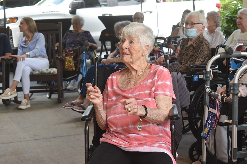Susan Master, a resident of The Windsor of Lakewood Ranch for one week, dances to Jesse Daniels Band. She says she has already eaten fabulous food and made wonderful friends during her time there.
