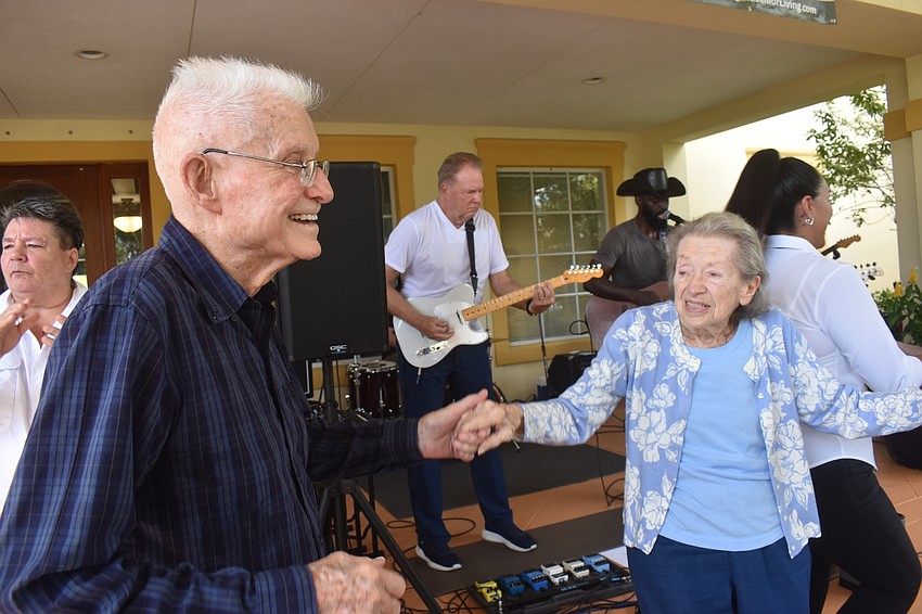 The Windsor of Lakewood Ranch residents Dale Higinbotham and Deb Arronis share a dance to the music of Jesse Daniels Band. 