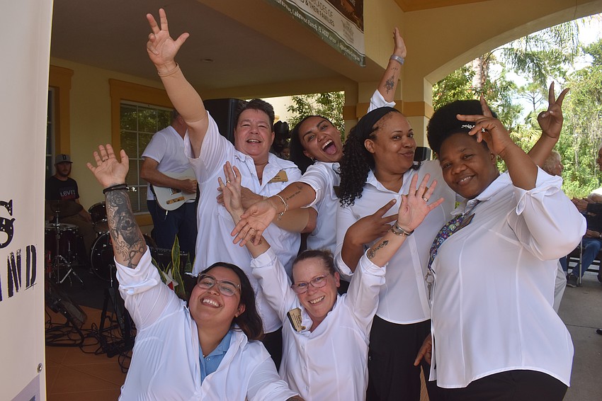 The Windsor of Lakewood Ranch staff members enjoy the 20th anniversary celebration on Sept. 2 through dance, food and more.