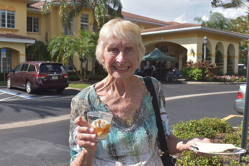 Barbara Birkenberger took a fruit dessert to go, but not before dancing to Jesse Daniels Band. She said she has danced with The Windsor of Lakewood Ranch resident Dale Higinbotham on a few different occasions.