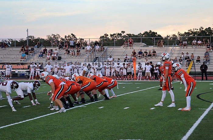 Sarasota football's offense lines up during the first quarter against Braden River. The Sailors would eventually win their home opener, 27-7, on Aug. 29.