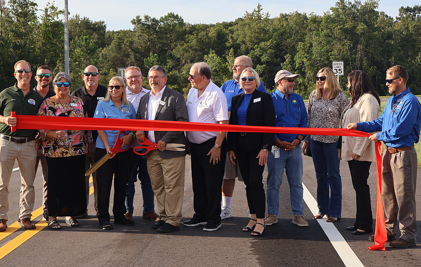 Bunnell and Flagler County officials celebrate the grand opening of Commerce Parkway. Courtesy of Flagler County