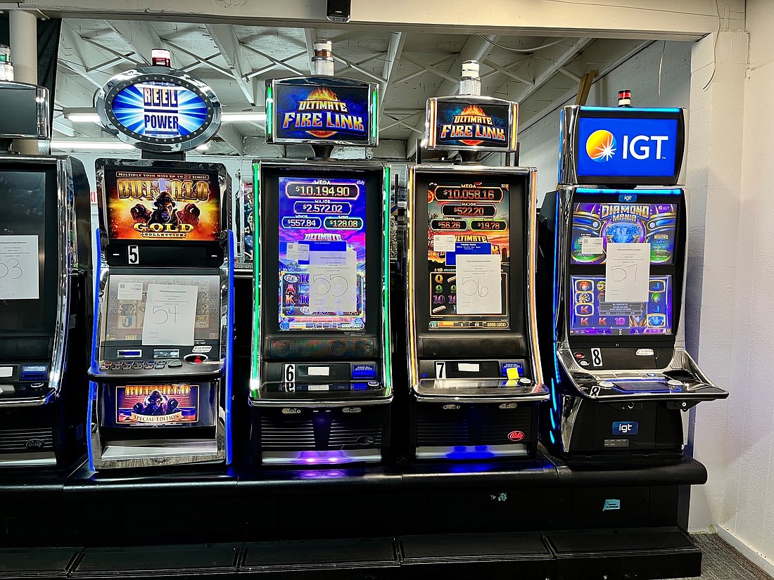 State agents seized 117 slot machines at Magic Arcade on Swift Road, according to the Sarasota County Sheriff's Office.