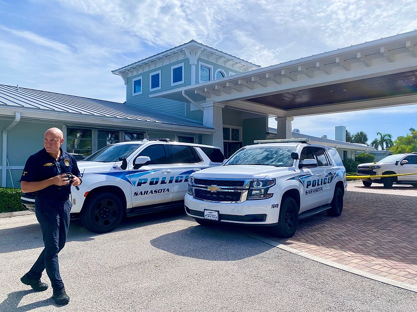 Sarasota Police Department Captain Demetri Konstantopoulos surveys the scene a final time before the demolitions team sets off a controlled explosion as part of their entry training.