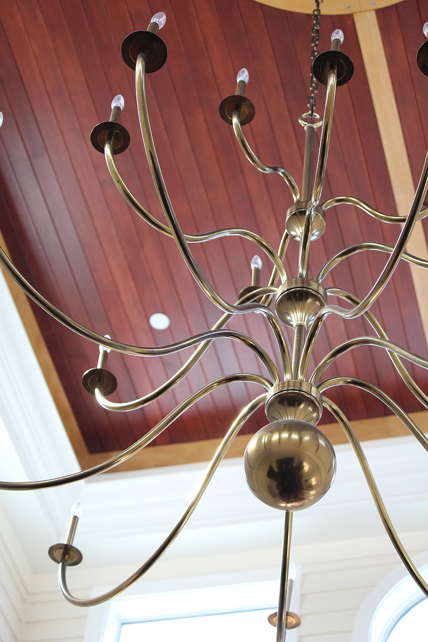 Little remains at the 65-year-old Bird Key Yacht Club clubhouse beyond the walls, the bar and a few chandeliers.