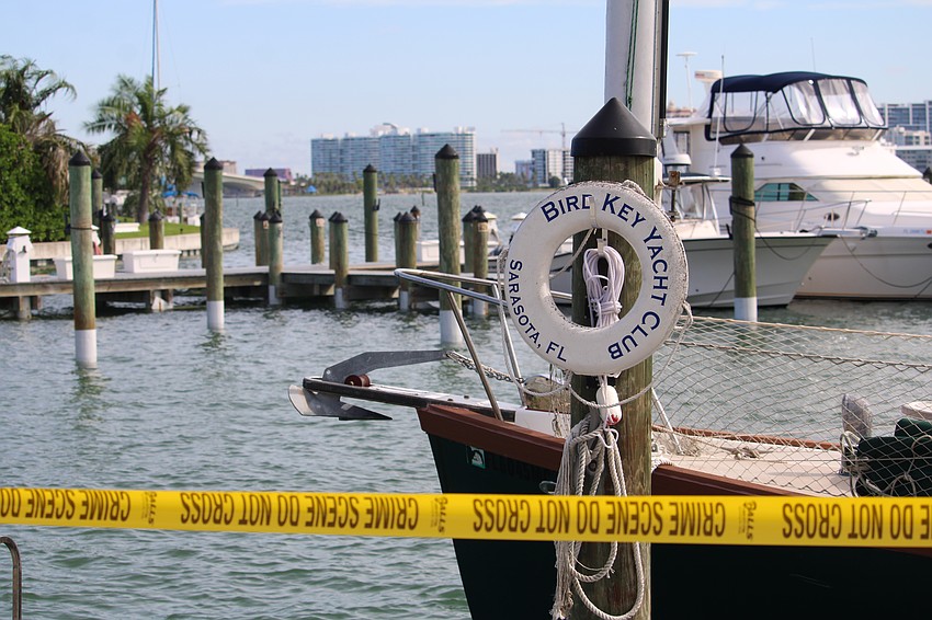 Officers took care in marking off the boundary around Bird Key Yacht Club's clubhouse for a detonation team training on Sept. 5. The building is slated for demolition this fall to make way for a new facility.