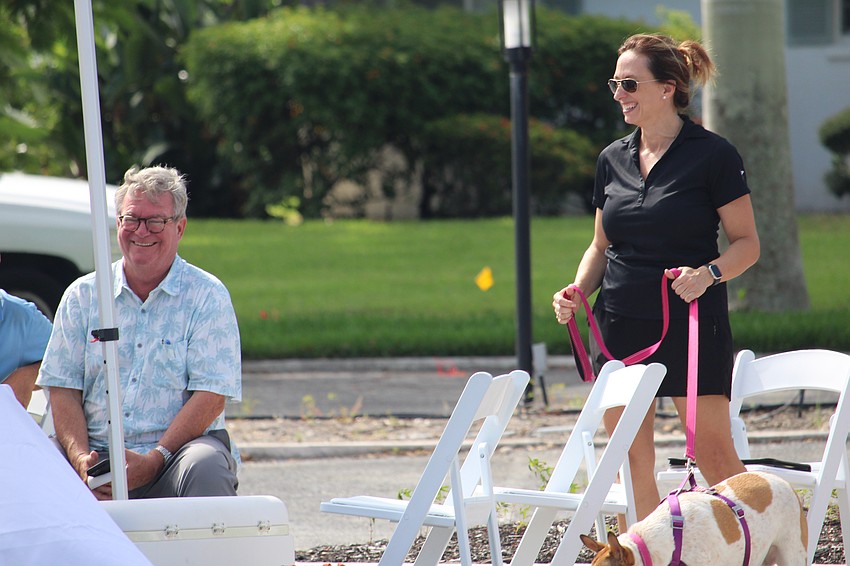 Bird Key Yacht Club Commodore Tony Britt and General Manager Tammy Hackney share a smile after the first explosive successfully detonates at a Sept. 5 explosives training with the Sarasota Police Department.