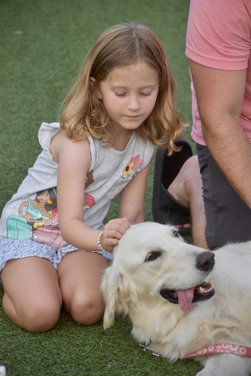 Sarasota's 5-year-old Tula Diaz couldn't resist introducing herself to 4-year-old Cesna.