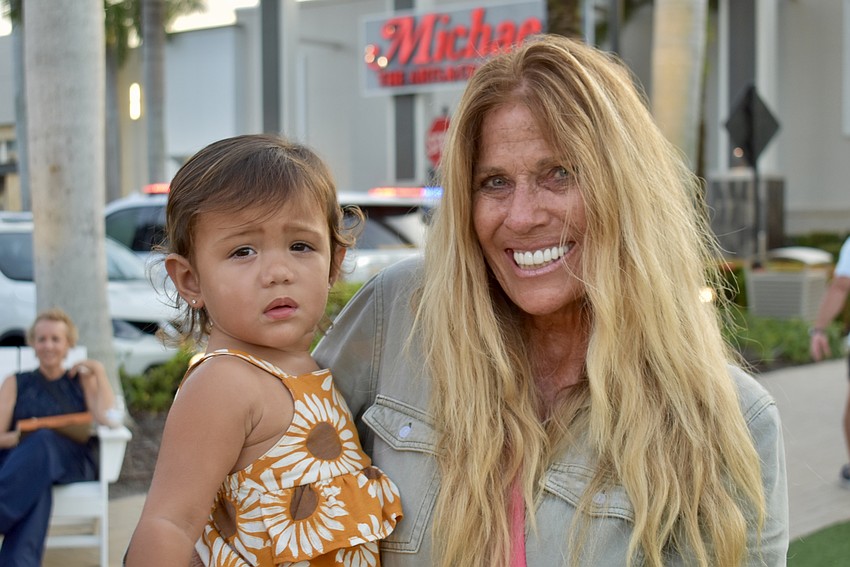 Lakewood Ranch's 1-year-old Kaiza Faufata Pedrian just woke up from a nap. Her grandma Jan Leonard is holding her.