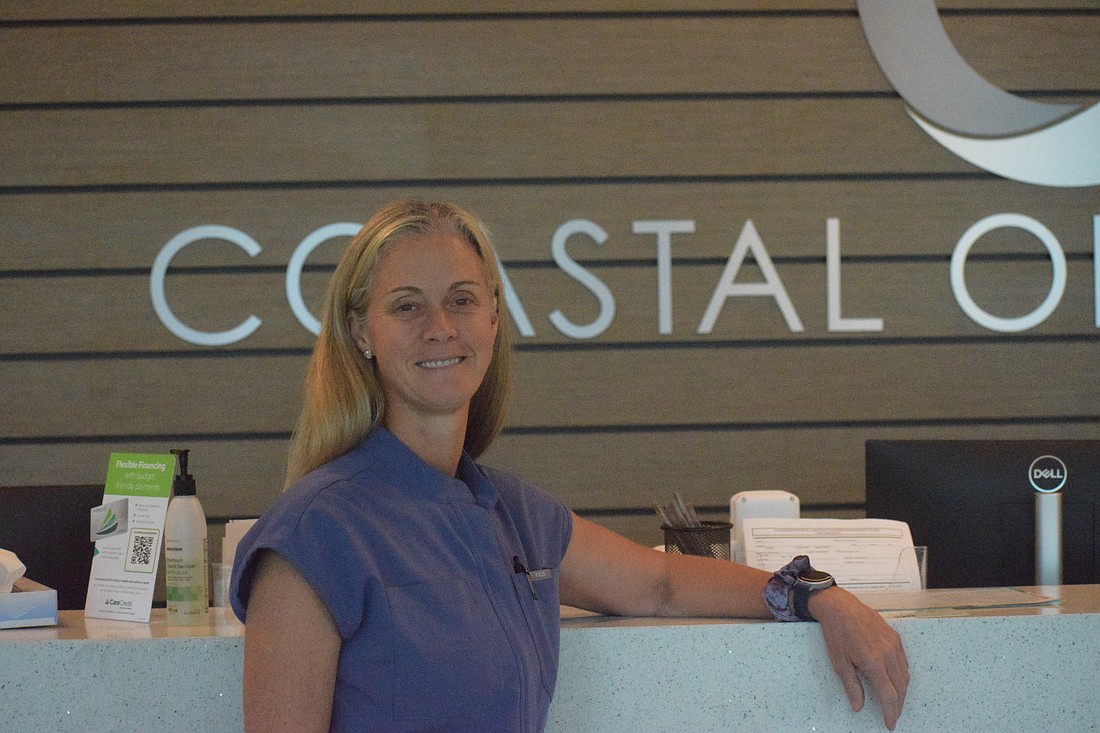 Dr. Sara Simmons, Hand and Wrist Specialist at Coastal Orthopedics, poses for a photo. The former elite rower is heading to the World Rowing Masters Regatta this week.