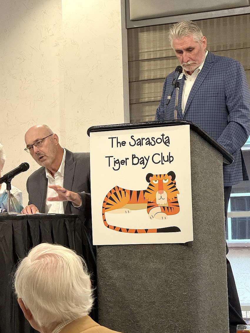 Sarasota Interim City Manager Dave Bullock (left) speaks to Tiger Bay Club members as moderator Jon Thaxton contemplates his next question.