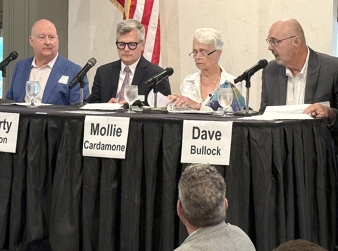 From left, Drayton Saunders, Marty Hylton, Mollie Cardamone and Dave Bullock comprised the panel for the Sept. 4 Tiger Bay Club meeting.