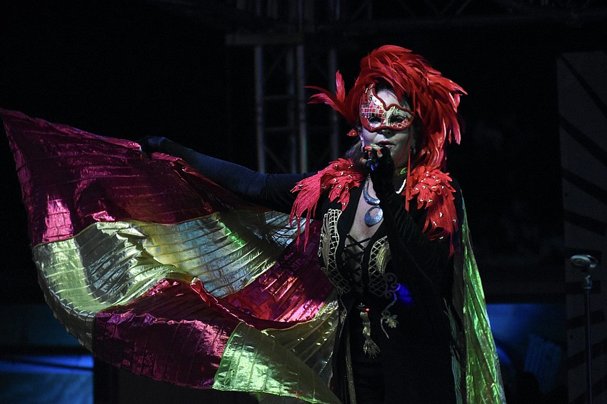 Renee Adorna of Gas House Gorillas performs on stage.