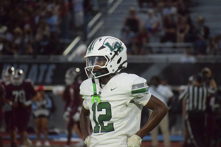 Ka'marion Jones pauses after a play to catch his breath during a game versus Braden River. The junior plays both ways for Lakewood Ranch football. Ka'marion Jones pauses after a play to catch his breath during a game versus Braden River. The junior plays both ways for Lakewood Ranch football.